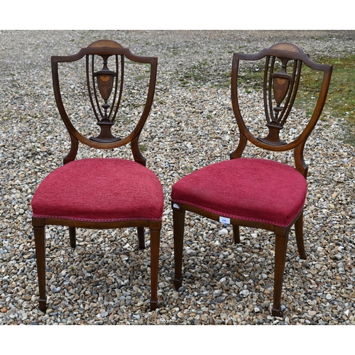 246 - # A pair of Sheraton style mahogany inlaid shield back dining chairs (2)