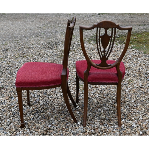 246 - # A pair of Sheraton style mahogany inlaid shield back dining chairs (2)