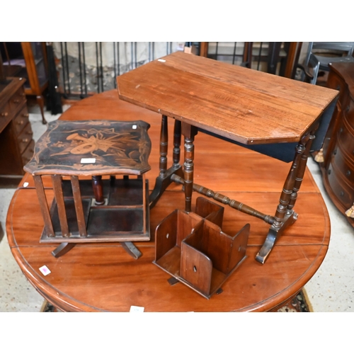 247 - An early 20th century table-top revolving bookcase with penwork muscial trophy to the top to/w mahog... 