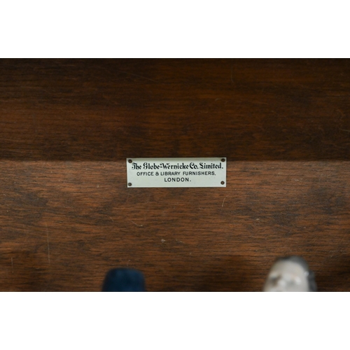 262 - Four oak Globe Wernicke library bookcases, the largest with four graduated glazed in sections, on a ... 