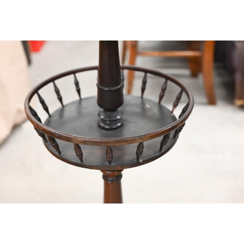 267 - A Victorian rosewood occasional table, the circular top over a galleried secondary tier and raised o... 