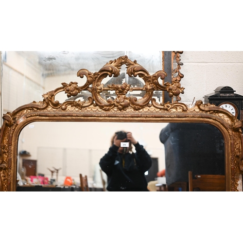 270 - A Victorian giltwood arched top over-mantel mirror, 120 cm w x 159 cm h o/all, worn surface finish, ... 