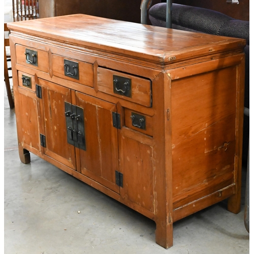 271 - An oriental elm cabinet with an arrangement of five drawers and centred by a pair of cabinets, 130 c... 