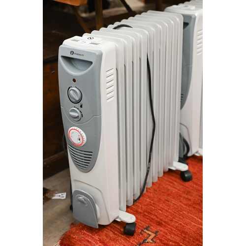 275 - A trio of 'Puremate' oil filled portable 240v radiators (3)