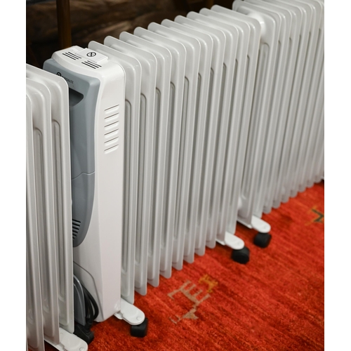 275 - A trio of 'Puremate' oil filled portable 240v radiators (3)