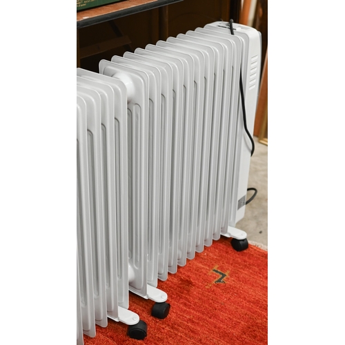 275 - A trio of 'Puremate' oil filled portable 240v radiators (3)