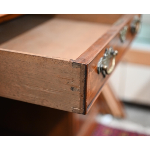 277 - A Victorian style walnut twin pedestal desk with nine drawers, 122 cmx 61 cm x 78 cm h 