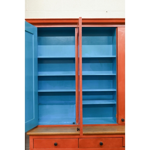 279 - A contemporary painted oak top kitchen cupboard, with three arched panel doors over three drawers an... 