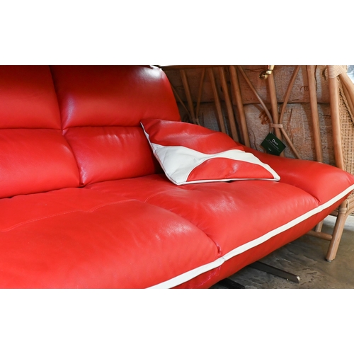 280 - Nicoletti Salotti, a Post-Modern Italian design red and white leather sofa, with two scatter cushion... 