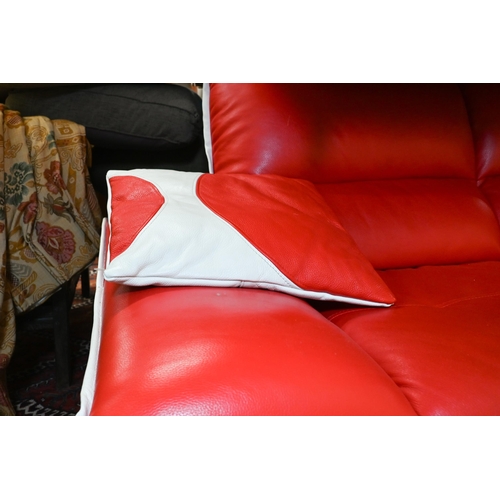 280 - Nicoletti Salotti, a Post-Modern Italian design red and white leather sofa, with two scatter cushion... 