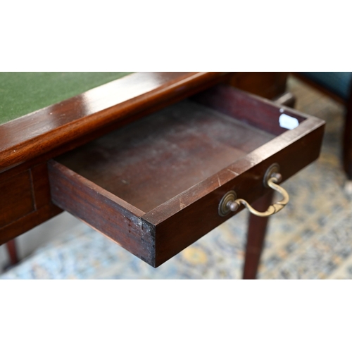 282 - A Victorian mahogany lobed corner fold over card table, with twin gate-legs and frieze drawer, raise... 