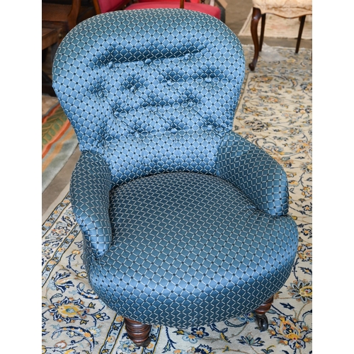 292 - A Victorian pre-dieu chair to/with a kneeling stool and a button-back nursing chair, upholstered in ... 