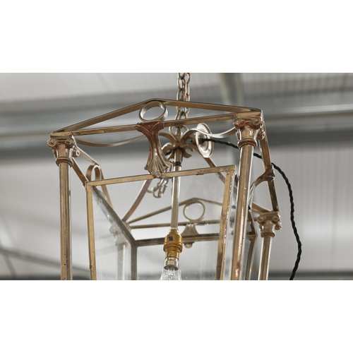 297 - A contemporary continental chromed brass hall lantern, approx. 60 cm h plus suspension chain