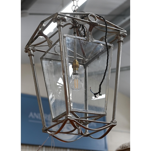 297 - A contemporary continental chromed brass hall lantern, approx. 60 cm h plus suspension chain