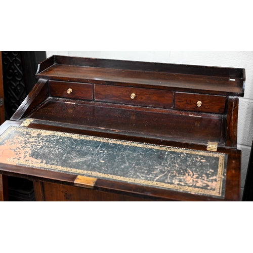 357 - # A Victorian rosewood desk with three drawers to one side, a conversion