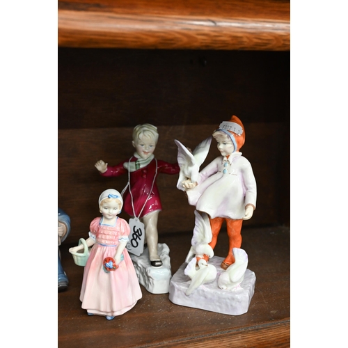 360 - Two Royal Worcester figures - 'January' 3452 and 'November' 3418 to/w three Royal Copenhagen figures... 