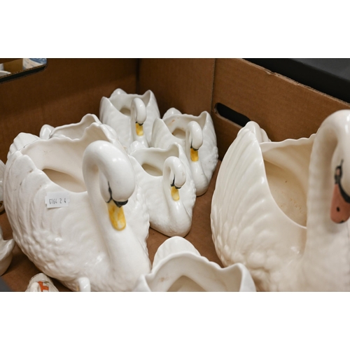 371 - A graduated collection of nine Dartmouth pottery swan-vases to/w ten crested china swans (box)