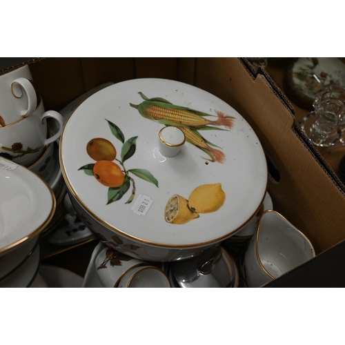 375 - # A quantity of Royal Worcester Evesham ware, including tureens, bowls and plates, egg cups and tea ... 