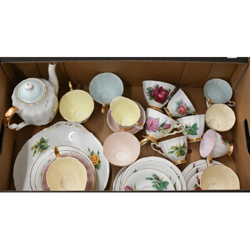 390 - A Paragon china 'World Famous roses' tea set and matching coffee set with jug (box)