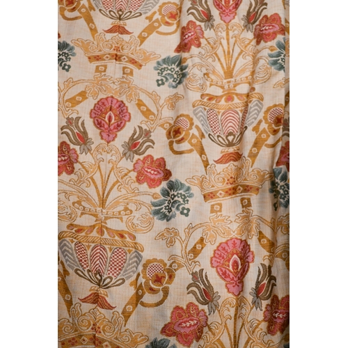 395 - A pair of bespoke full length curtains with triple pleat heading, ochre ground with green and red st... 