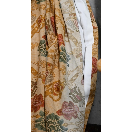 395 - A pair of bespoke full length curtains with triple pleat heading, ochre ground with green and red st... 