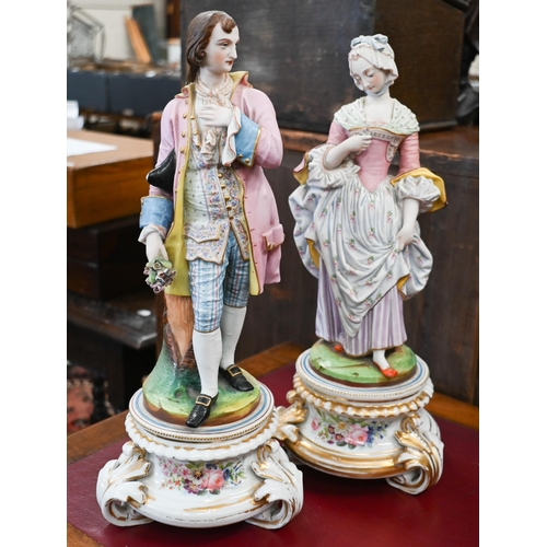 397 - A pair of 19th century Continental painted bisque figures of an 18th century courting couple, on flo... 