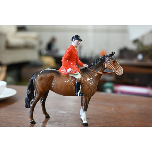 401 - A Beswick huntsman with five hounds