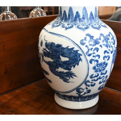 405 - A Chinese blue and white porcelain vase, printed and painted with dragons, 32 cm to/w a hexagonal ta... 