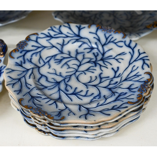 413 - An early 19th century blue-glazed creamware part fruit service embossed with seaweed, comprising thr... 