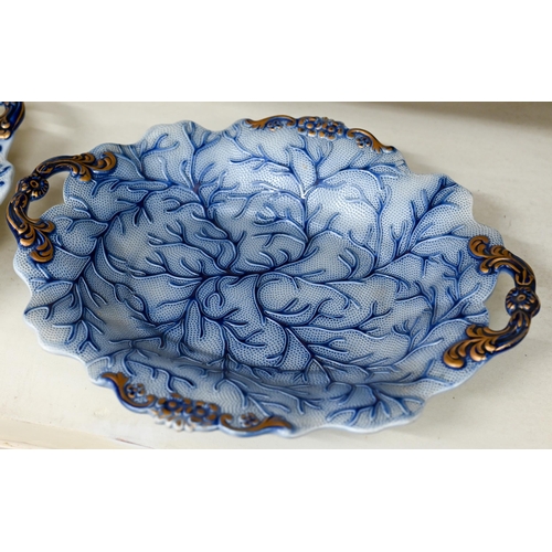 413 - An early 19th century blue-glazed creamware part fruit service embossed with seaweed, comprising thr... 