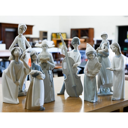 414 - Six Lladro figures and two other Spanish figures (8)