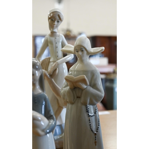 414 - Six Lladro figures and two other Spanish figures (8)