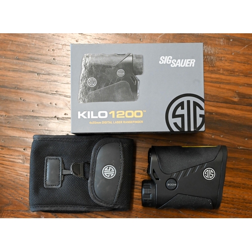 421 - A boxed Sigsauer kilo 1200 4 x 20mm Digital Laser Range finder, with case (little used) - retailed a... 