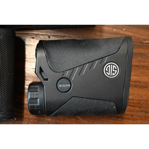 421 - A boxed Sigsauer kilo 1200 4 x 20mm Digital Laser Range finder, with case (little used) - retailed a... 