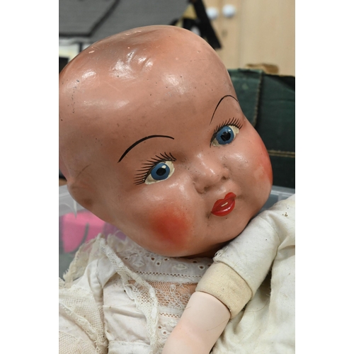 427 - An antique doll with wax head and shoulders and forearms, on stuffed fabric body a/f, to/w a bisque-... 