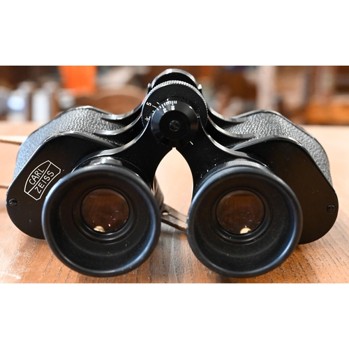 446 - A cased pair of Carl Zeiss 8 x 30 binoculars no 797439