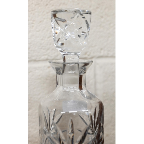 448 - # Two cut glass decanters - one with silver collar (2)