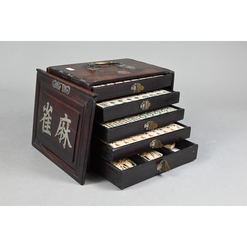 451 - An antique Chinese Mah Jong set with bone and bamboo tiles, in rosewood case with five drawers