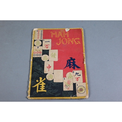 451 - An antique Chinese Mah Jong set with bone and bamboo tiles, in rosewood case with five drawers