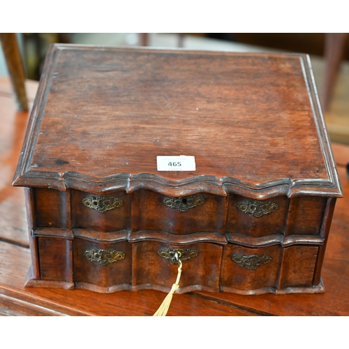 465 - An antique Dutch Cape style jewellery casket with sloping top, serpentine front with lower drawer an... 