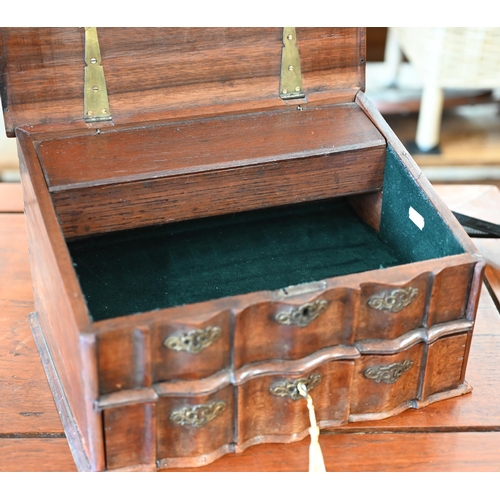 465 - An antique Dutch Cape style jewellery casket with sloping top, serpentine front with lower drawer an... 