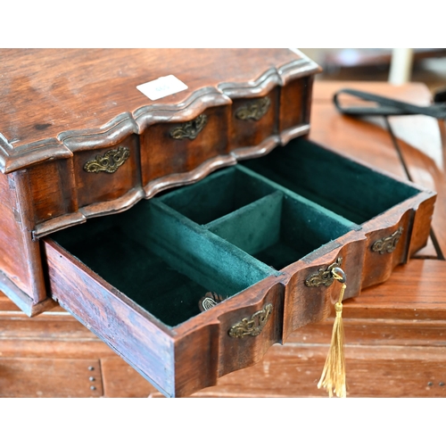 465 - An antique Dutch Cape style jewellery casket with sloping top, serpentine front with lower drawer an... 