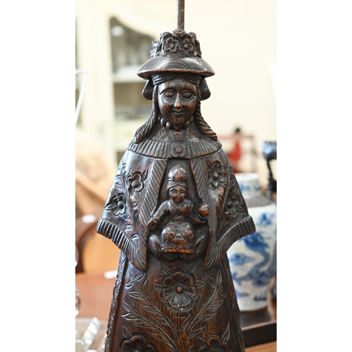 472 - A Continental stained and carved pine Madonna & Child, as a table lamp, 59 cm high