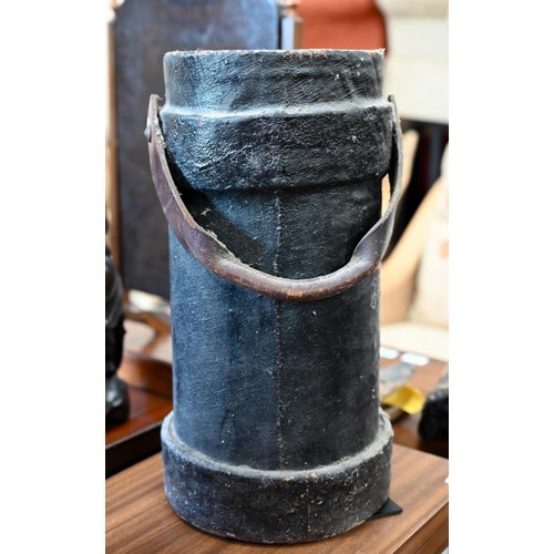 473 - An antique Naval shot/powder-bucket with vestigial painted coat of arms