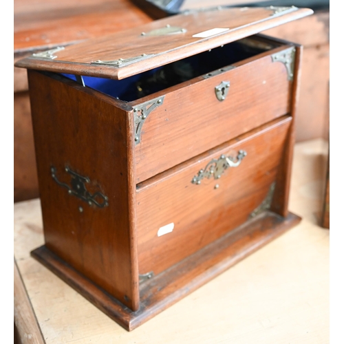 498 - A Victorian brass-mounted walnut jewellery casket with mechanical rising top and fall front to blue ... 