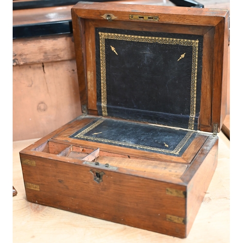 498 - A Victorian brass-mounted walnut jewellery casket with mechanical rising top and fall front to blue ... 