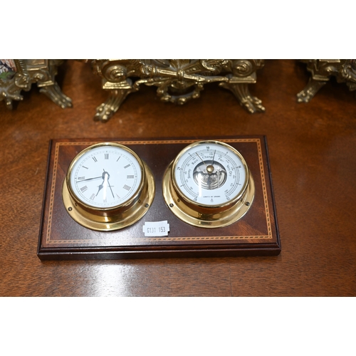 499 - A reproduction brass and ceramic three piece clock garniture set to/w a pair of mirror obelisk giltw... 