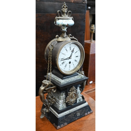 501 - A brass-mounted marble mantel clock with mixed decorative motifs, 42 cm