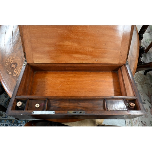 502 - A Victorian brass-bound walnut writing slope with fitted interior and secret compartment, 51 cm wide