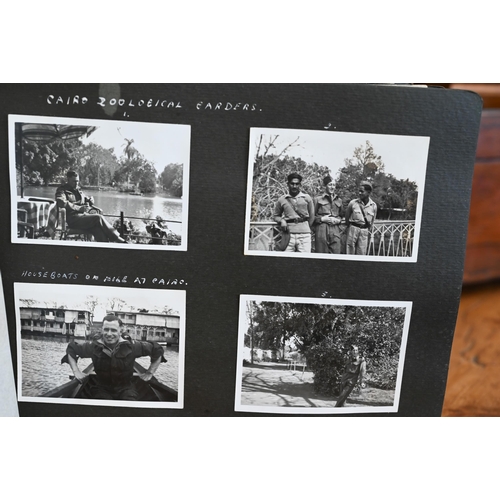 508 - An album of World War II photographs of RAF life in active service, mostly in Egypt, to/w loose phot... 